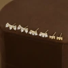 Three-piece set of golden arc-shaped diamond-shaped heart-shaped earrings for women, detachable and stackable, with a unique design sense details Picture